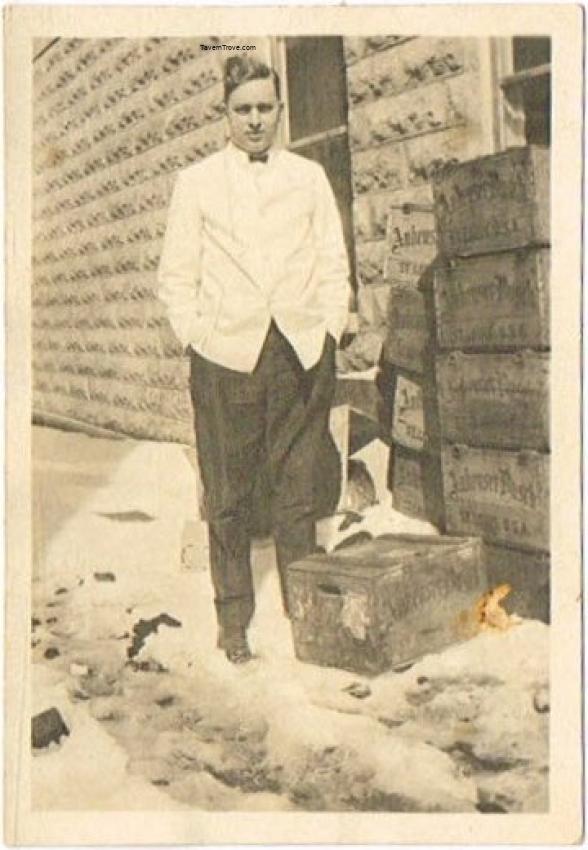 Bartender with Anheuser-Busch Crates