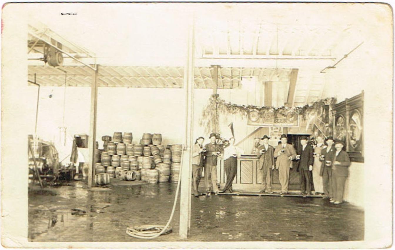 Brewery workers in keg washing room