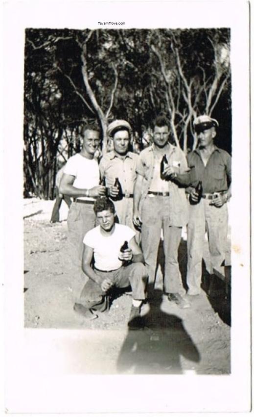Men With Non-US Beer Bottles